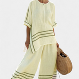 Salopeta s širokim prugama i asimetričnim rezom - moderno i udobno stil